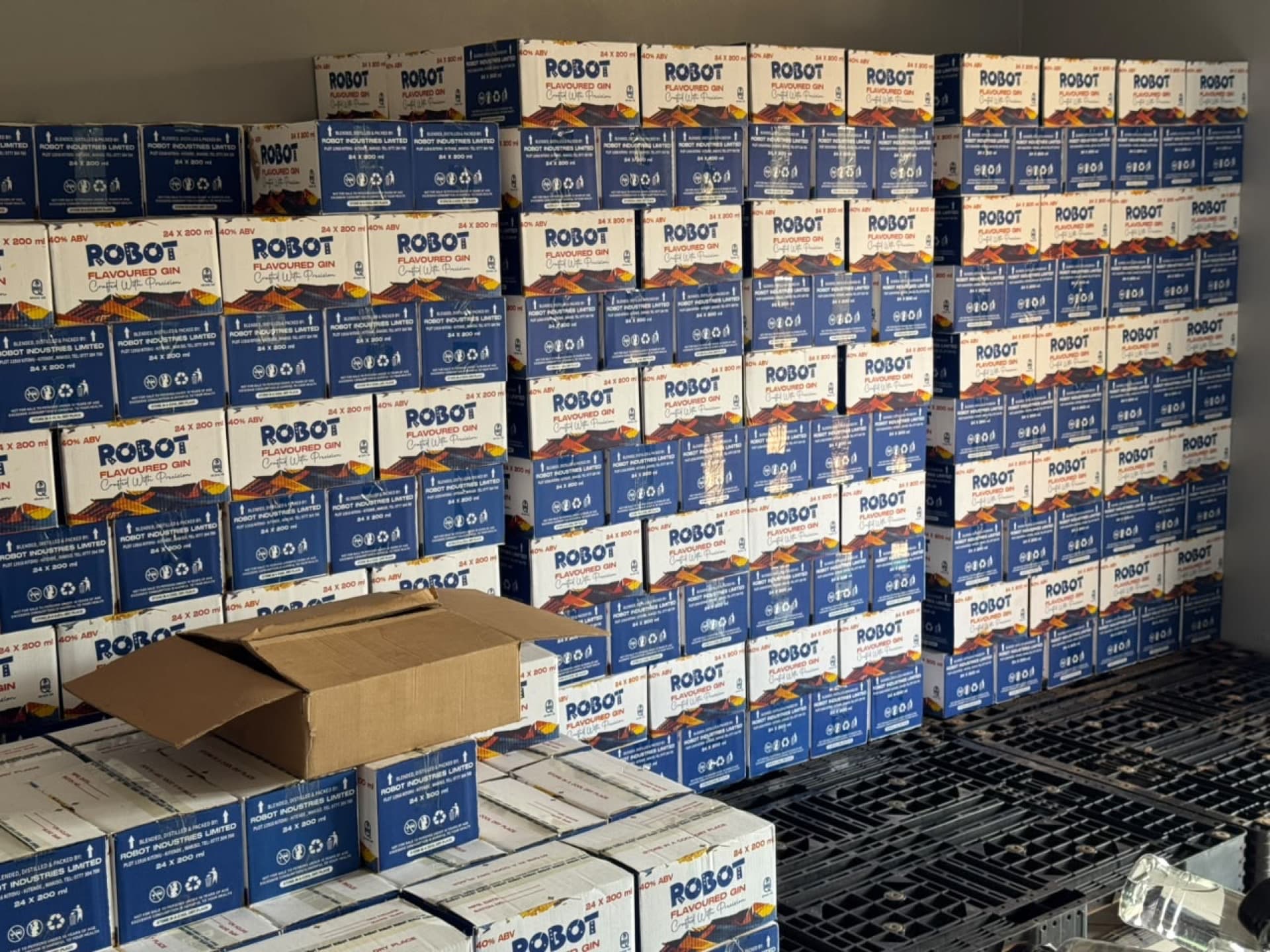 Robot Flavoured Gin cartons stacked in the Robot Industries warehouse